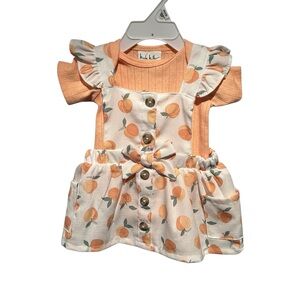 NWOT Nicole Miller Peach Baby Dress